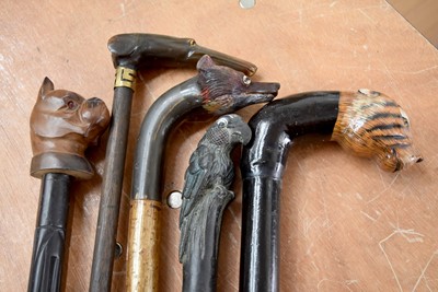 Lot 342 - A group of five Animal Head topped walking canes