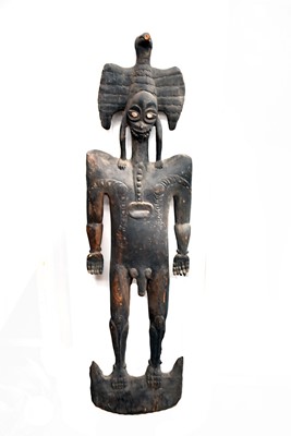 Lot 381 - A large carved wooden African Male Figure