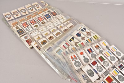 Lot 447 - Military Medals and Regimental Standards/Badges Themed Cigarette Card Sets (45)