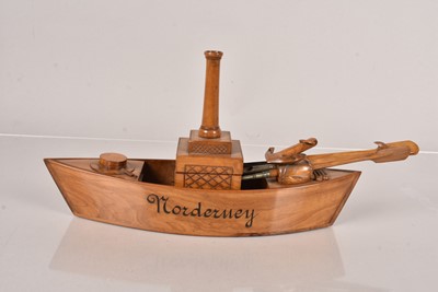 Lot 599 - A vintage inkwell in the form of a German Ship