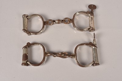 Lot 675 - Two pairs of Hiatt Handcuffs/Restraints