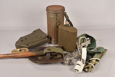 Lot 676 - A German Gas Mask within Cannister