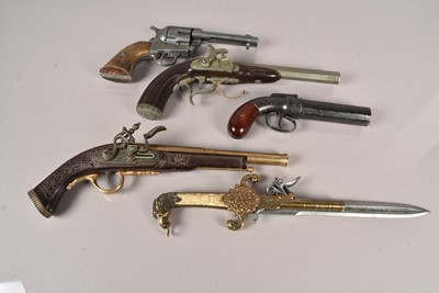 Lot 678 - A group of five decorative wall mount pistols