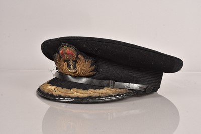 Lot 701 - A Naval Captain's Peak Cap by Moss Bros