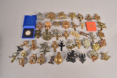 Lot 722 - A collection of British Cap badges
