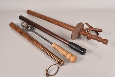 Lot 812 - A group of four long truncheons/bludgeons