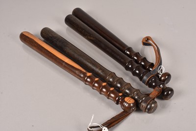 Lot 818 - A group of four Metropolitan Police wooden truncheons