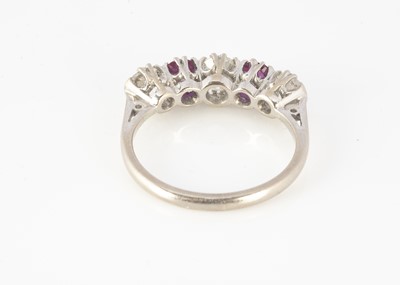 Lot 103 - An 18ct white gold ruby and diamond five stone dress ring