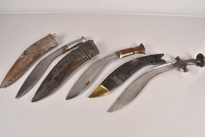 Lot 939 - Three Middle Eastern Kukri knives