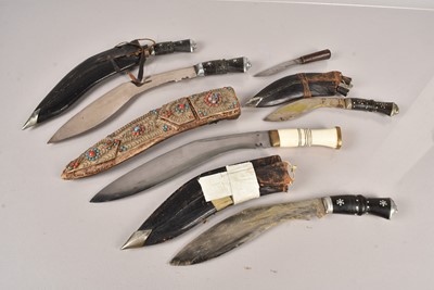 Lot 944 - A Middle Eastern Bone Handled Kukri knife and scabbard