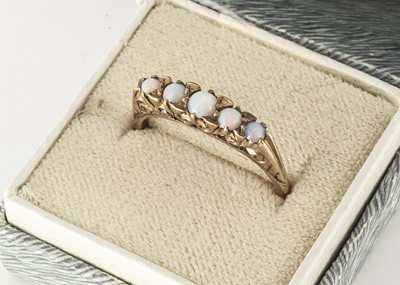 Lot 109 - A five stone opal dress ring