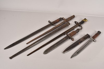 Lot 990 - An assortment of World Bayonets