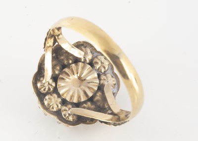 Lot 110 - A 19th Century French paste cluster ring