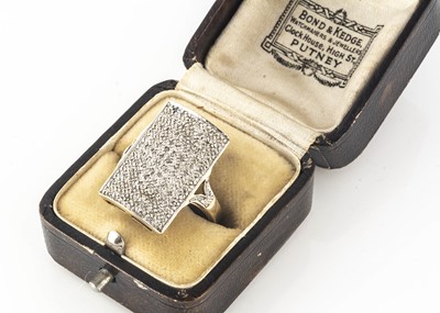 Lot 111 - A 9ct gold tablet diamond dress ring