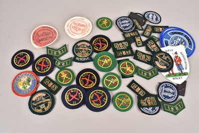 Lot 1047 - An assortment of Rifle Association related cloth and bullion badges