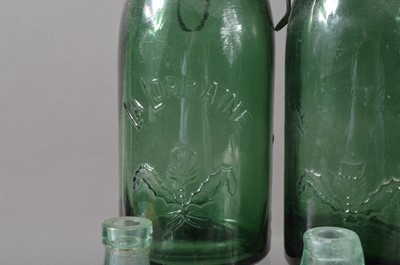 Lot 82 - Six green glass La Lorraine storage jars