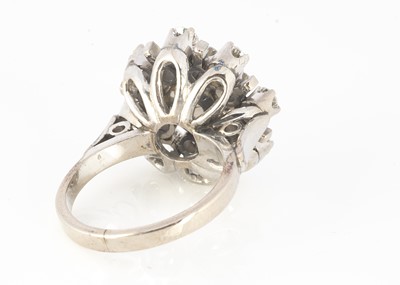 Lot 128 - An 18ct white gold diamond and cultured pearl dress ring