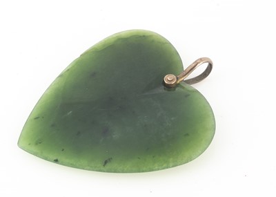 Lot 130 - A New Zealand green stone heart shaped pendant