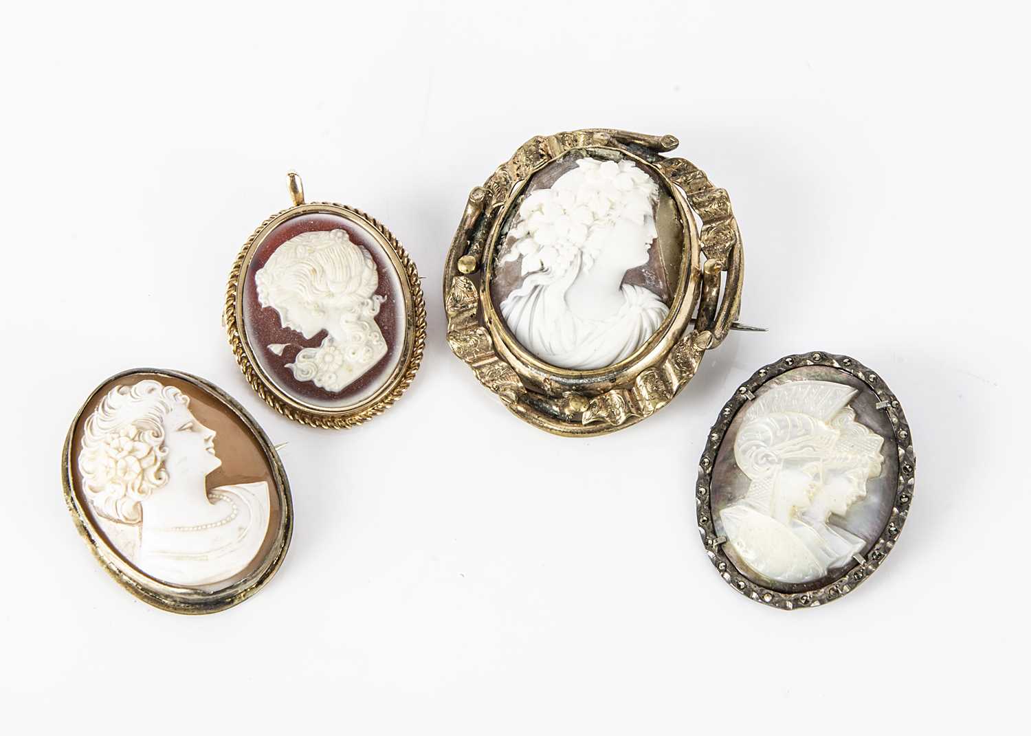 Lot 137 - Four carved and moulded cameos