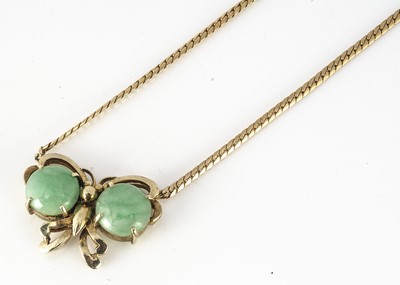 Lot 149 - A 14ct gold and jadeite jade butterfly pendant and chain