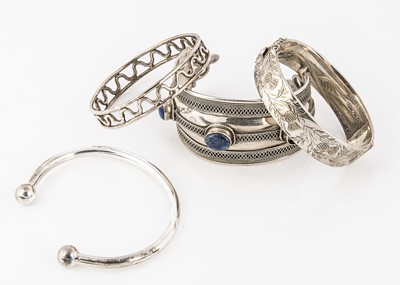 Lot 161 - A collection of silver bangles