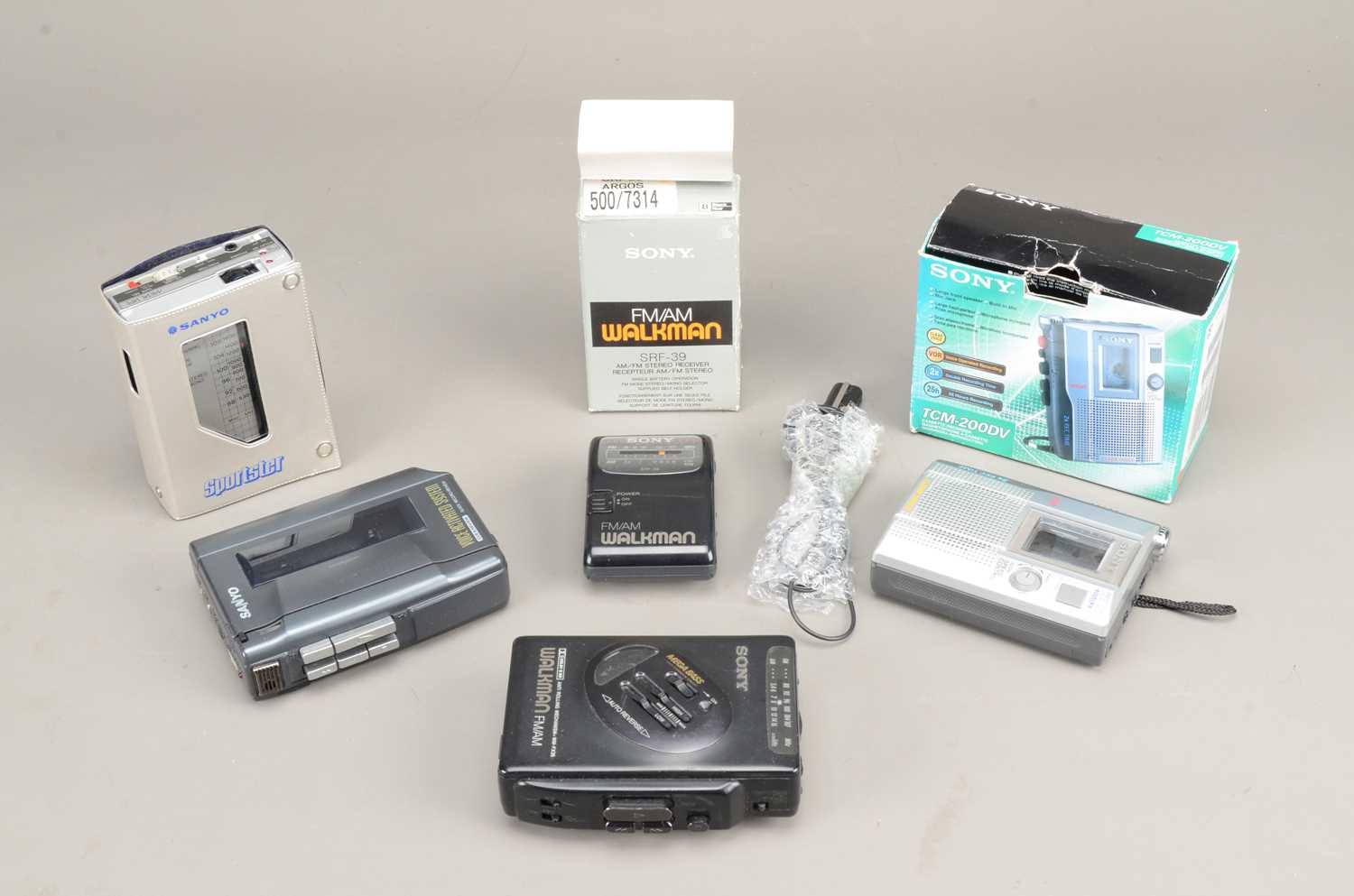 Lot 566 - Sony Walkman / Sanyo Cassette Players / Receivers