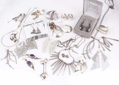 Lot 5 - A collection of silver, white metal  and plated earrings and jewels