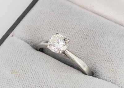 Lot 8 - A diamond solitaire platinum ring