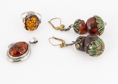 Lot 173 - A pair of amber and enamel drop earrings