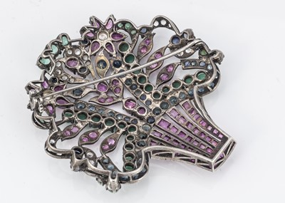 Lot 31 - An Indian white metal and multi gem set floral brooch