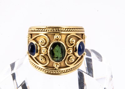 Lot 47 - A continental 18ct gold tourmaline and sapphire dress ring