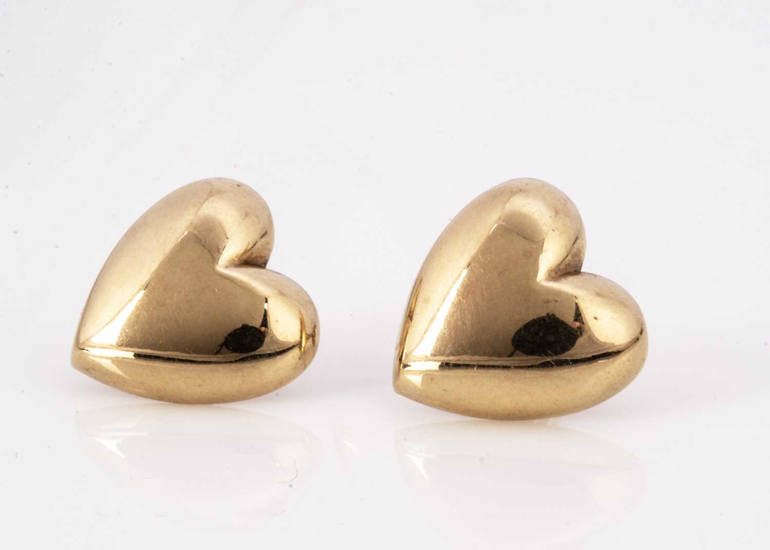 Lot 54 - A pair of 9ct gold heart shaped stud earrings