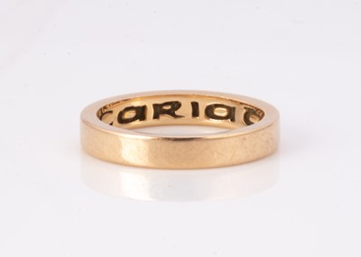 Lot 56 - A Welsh 18ct gold court shaped wedding band