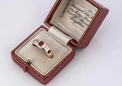 Lot 61 - A five stone ruby and diamond dress ring