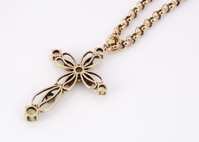 Lot 63 - A 9ct gold peridot openwork cross