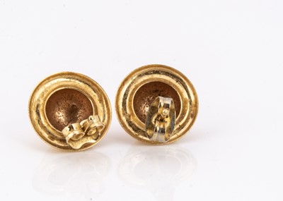 Lot 64 - A pair of domed 18ct gold stud earrings