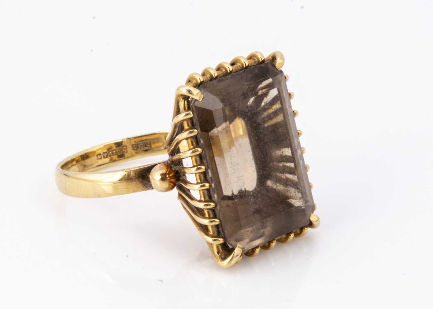 Lot 71 - An 18ct gold smoky quartz cocktail dress ring