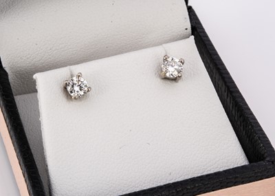 Lot 72 - A pair of diamond stud earrings