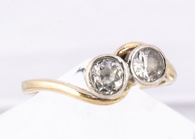 Lot 73 - A diamond crossover 9ct gold dress ring