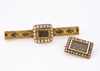 Lot 79 - A 19th Century plaited hair, seed pearl and gold mourning brooch