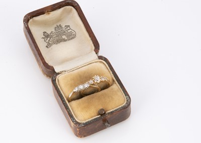 Lot 80 - An 18ct gold five stone old cut diamond dress ring
