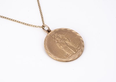 Lot 83 - A 9ct gold St Christopher medallion on a fine curb link chain