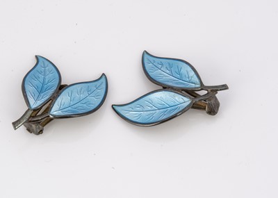 Lot 126 - A pair of David Andersen silver and enamel leaf ear clips