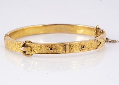 Lot 141 - A Victorian 9ct gold buckle bangle