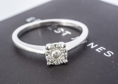 Lot 152 - A 9ct white gold diamond set dress ring