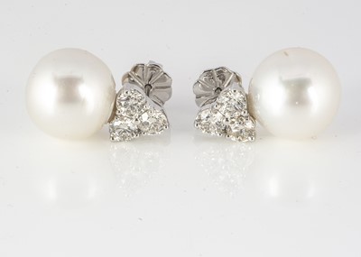 Lot 186 - A pair of 18ct white gold trefoil diamond and pearl earrings