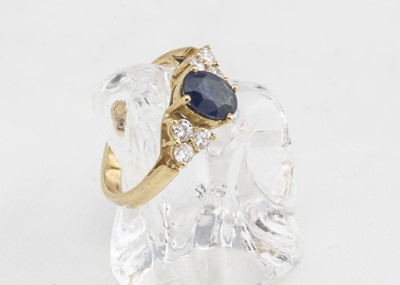 Lot 175 - A continental yellow metal sapphire and diamond dress ring