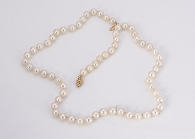 Lot 203 - A string of uniform knotted cultured pearls