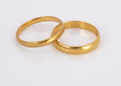 Lot 217 - Two 22ct gold wedding bands