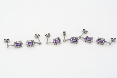 Lot 191 - Three pairs of white metal, amethyst and diamond drop earrings